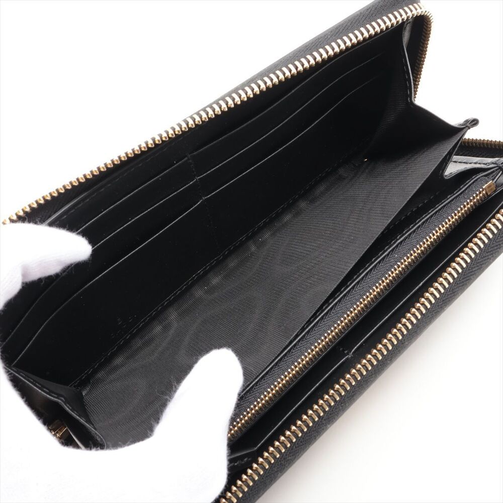 Gucci GG Matelasse Leather Round Zip Wallet Black - Picture 4 of 8